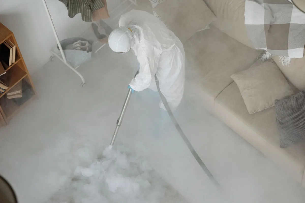 Biohazard cleanup technician in protective equipment, Red Bank, SC